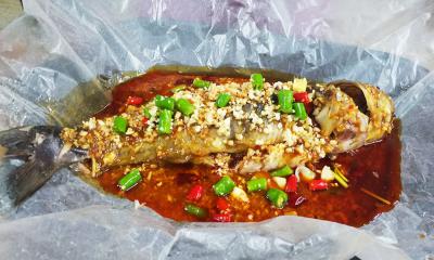  成都特色餐飲培訓(xùn)學(xué)校，哪里可以學(xué)正宗紙包魚技術(shù)培訓(xùn)？